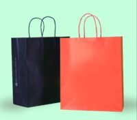 Plain black and red paper bags with twisted handles, suitable for eco-friendly packaging