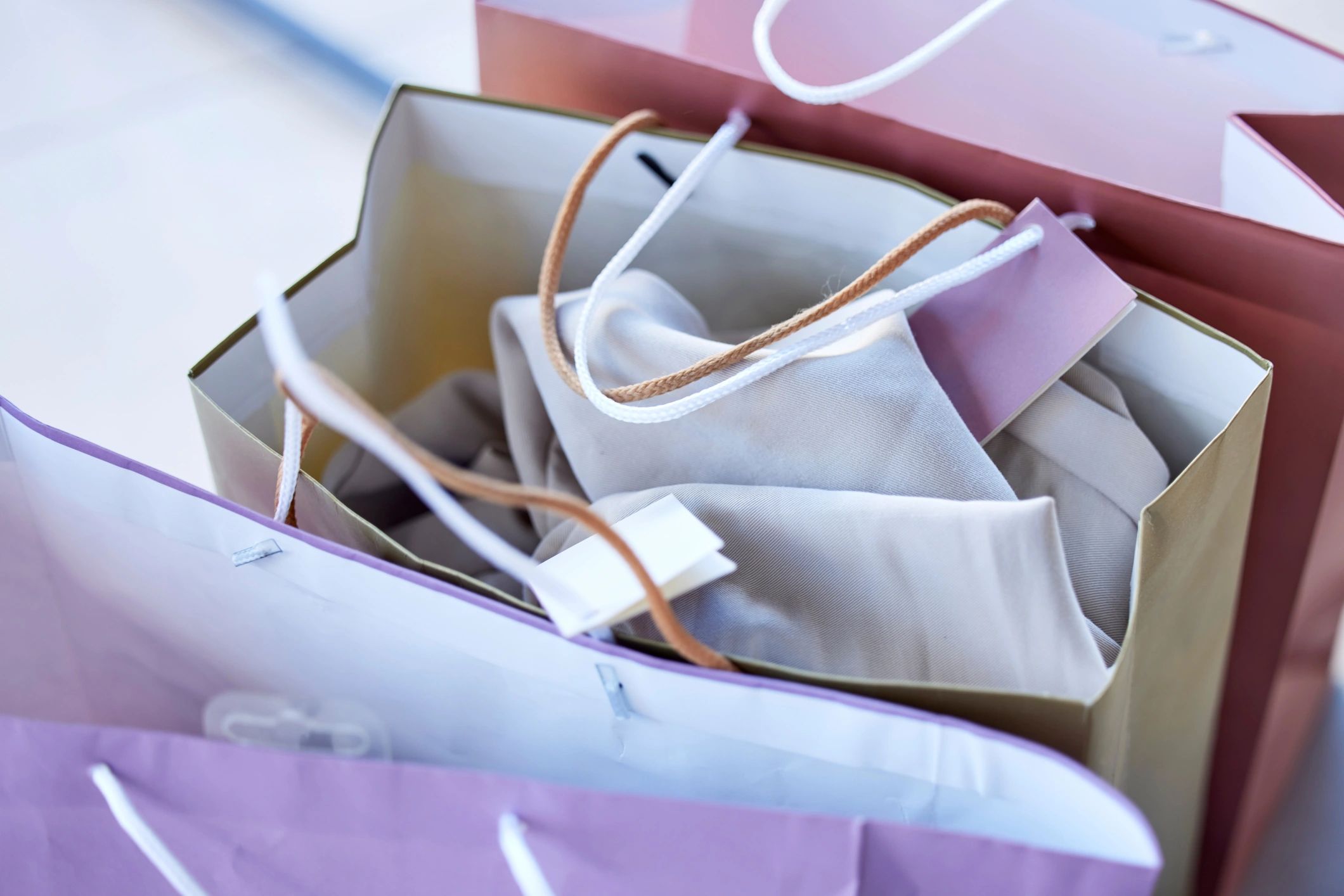 Retail fashion shopping bags in a boutique environment