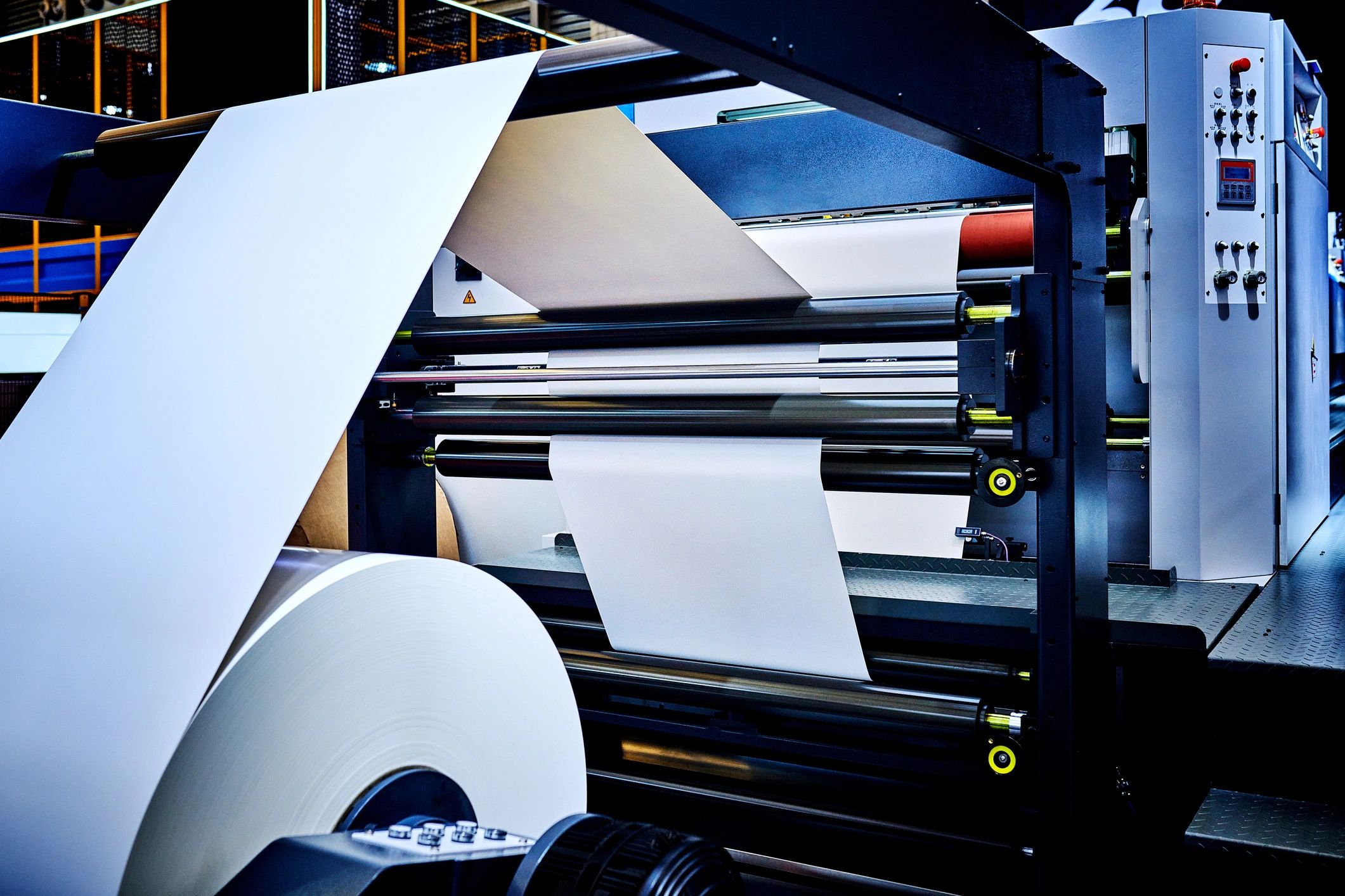 Close-up of printing press rollers in operation