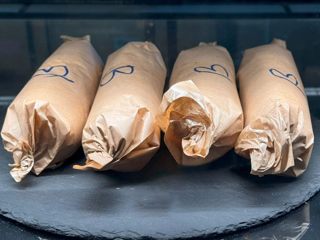 Freshly Wrapped Sandwiches on a Tray